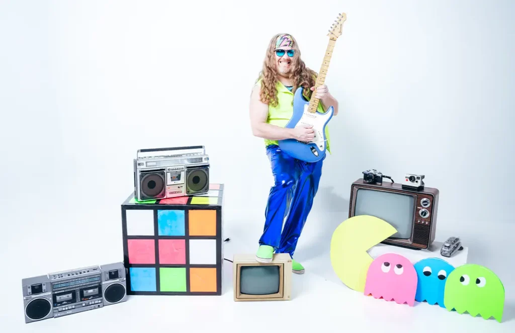 tommy hagar playing guitar around 80s props